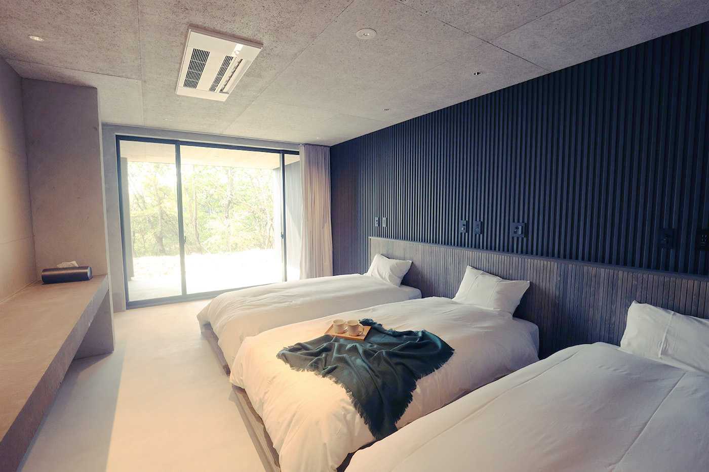 施設のお部屋のA（シングルサイズベッド 3 台）